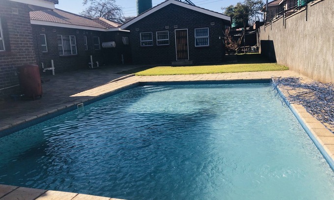 Harare House | Fully furnished and secure four bedroomed home