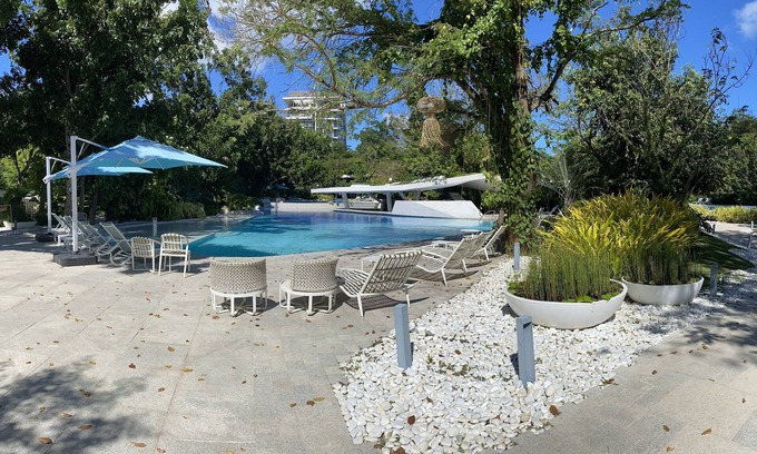 Maribago Condo | Fun at the beach splash in pools or just relax and enjoy the serenity of nature