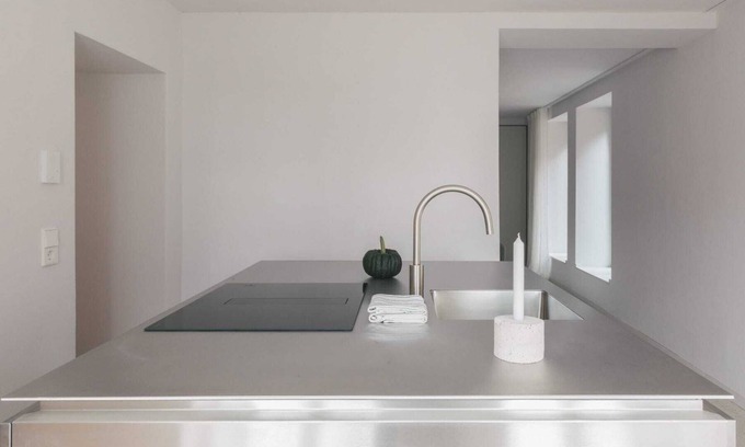 Werben Apartment | GARDEN FLOOR EAST: wood-burning stove and terrace to the southeast