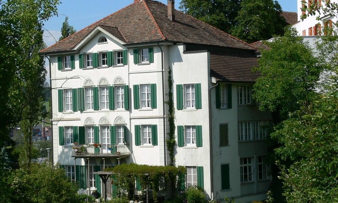Bischofszell Apartment | Generous living comfort in a distinctive old town house with a large garden