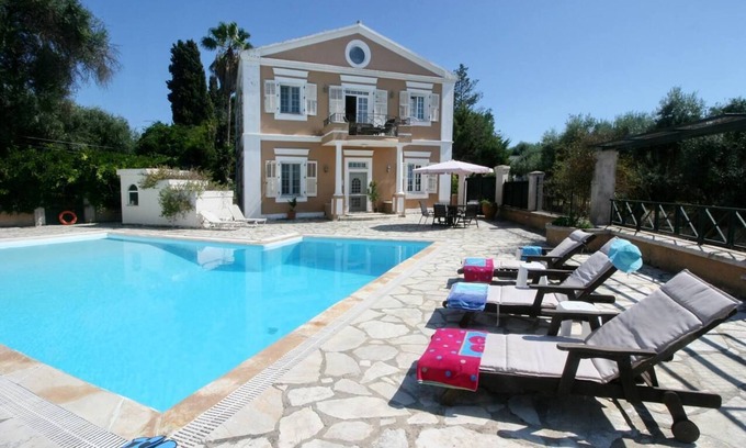 Perama Villa | Gerald Durell Pink Strawberry Pool Villa