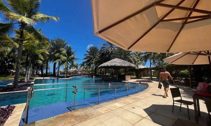 Loteamento Parque das Fontes Apartment | Golf ville residence with pool and beachfront location