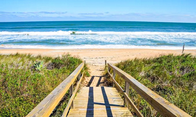 Amelia City House | Gorgeous coastal getaway with large yard, firepit, & screened porch