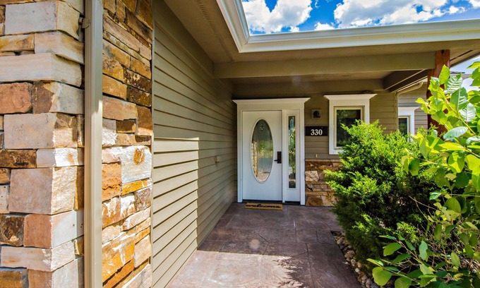 Stanley Hills Condo | Gorgeous home with private hot tub, large deck, and views of the Estes Valley