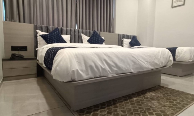 Chandkheda Hotel | Goroomgo Asiana Motera Ahmedabad