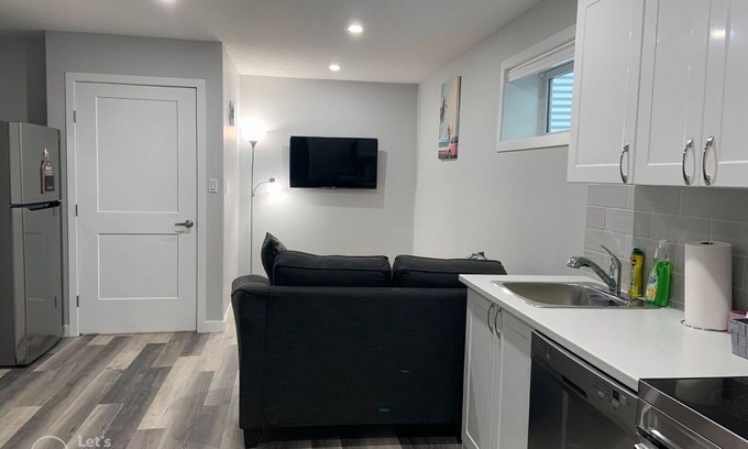 Regina House | Guest Suite in Regina - Queen Bed