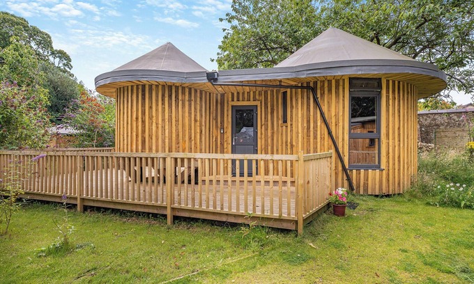 Polmont Cottage | Have a fab time in this unique, triple-circle treehouse.