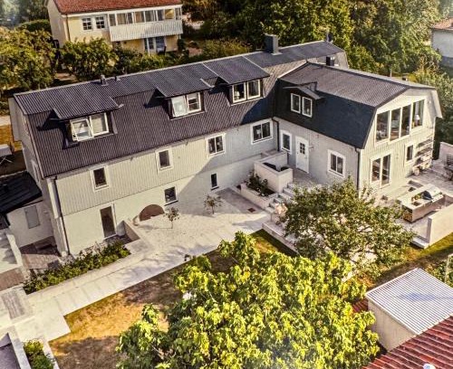 Innerstaden Apartment | Havsutsikt & Solnedgång i två plan på 100kvm för 6p