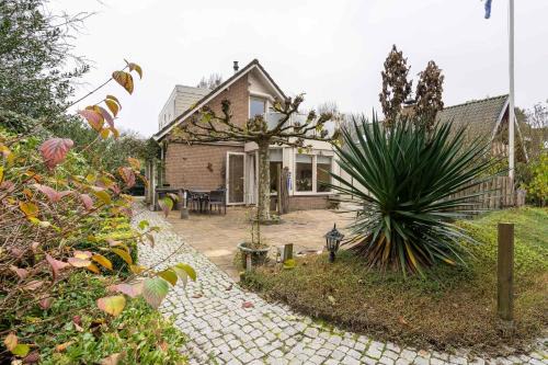Bruinisse House | Hello Zeeland - Vakantiewoning Elf Boompjes 83