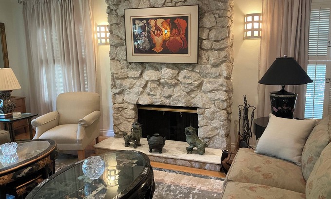 Mid City House | Historic Hollywood Haven in LA with Lush Garden, Balconies & Star-Studded Past