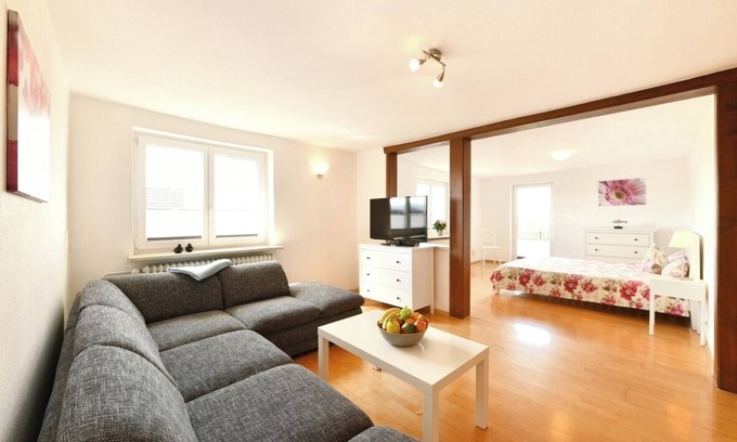 Enzisweiler Apartment | Holiday Apartment 'Dinkelbach Landhaus 1 A Charmant' with Lake View, Balcony and Wi-Fi