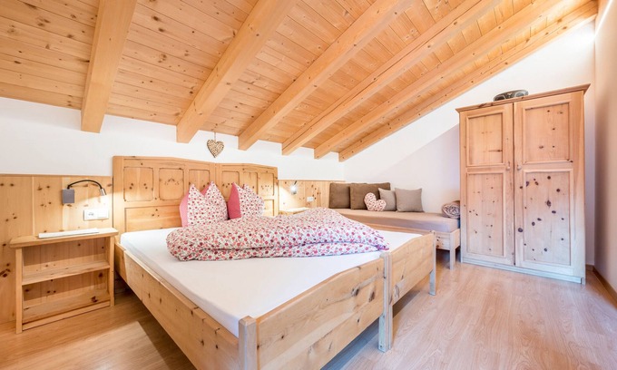 Luson Apartment | Holiday Apartment "Raffreiderhof Apt Zirbe" with Mountain View, Pool & Wi-Fi