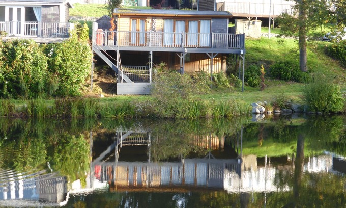 Bont Newydd Ski Chalet | Holiday Chalet With Lovely Views towards the Lake In 100 Acres of parkland