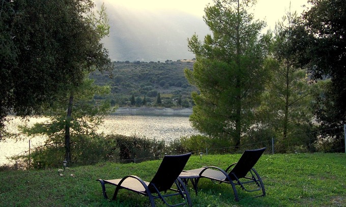 Eleios-Pronnoi Cottage | Holiday cottage with shared swimming pool and lake view in the countryside.
