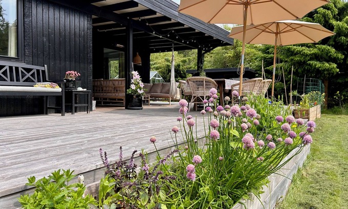 Hojby Cottage | Holiday home by Denmark's best beach, with large terrace & family activities