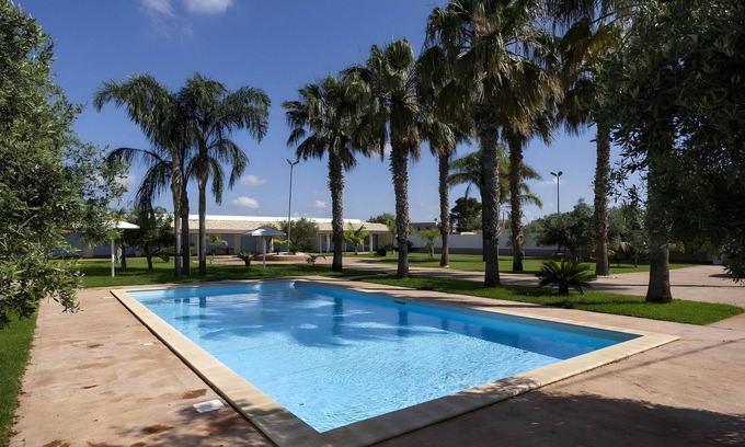 Mazara del Vallo Apartment | Holiday Home 'La Perla Di Mare - Ambra' with Shared Pool, Wi-Fi and Air Conditioning