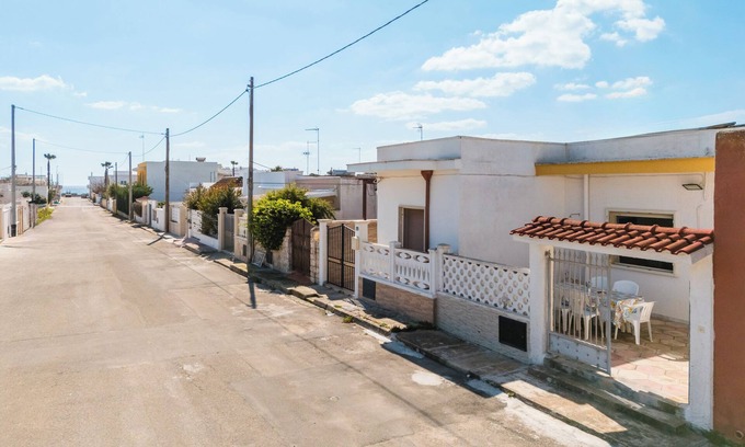 Torre Lapillo House | Holiday Home 'Nina' with Private Garden and Air Conditioning