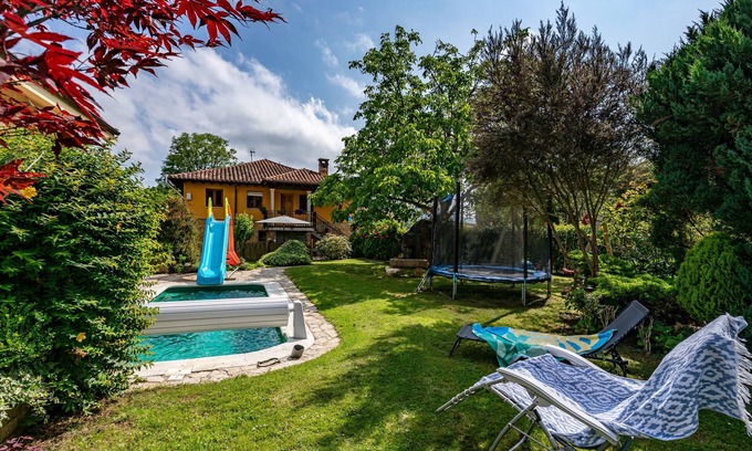 San Juan de Parres House | Holiday Home with Mountain Views, Heated Pool, and Children's Playground