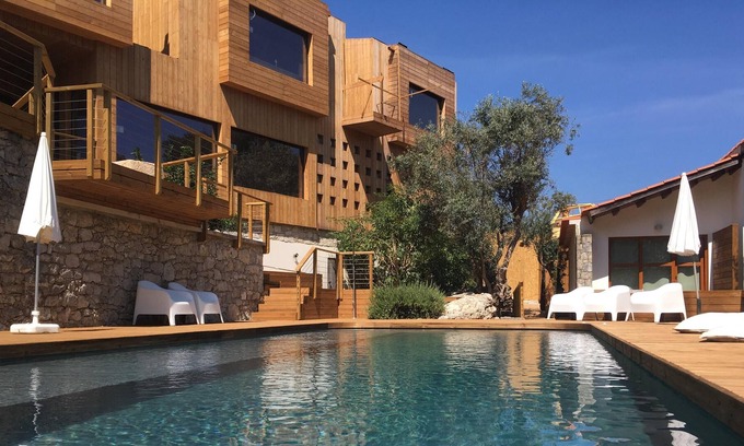 Alvados Apartment | Homerez - Appartement for 2 ppl. with shared pool, garden and balcony at Alvados