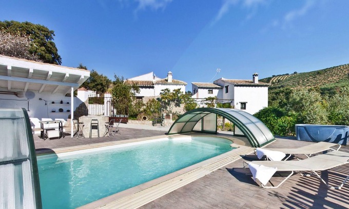 Serval Villa | Homerez - Villa for 21 ppl. with swimming-pool, jacuzzi and garden at Granada