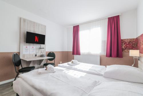 Berenbostel Hotel | Hotel Café Galerie I Hannover-Garbsen I Free Parking