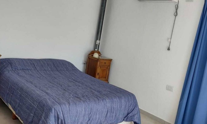 Nueva Cordoba House | House by the lake Puerto del Aguila inbalo 01