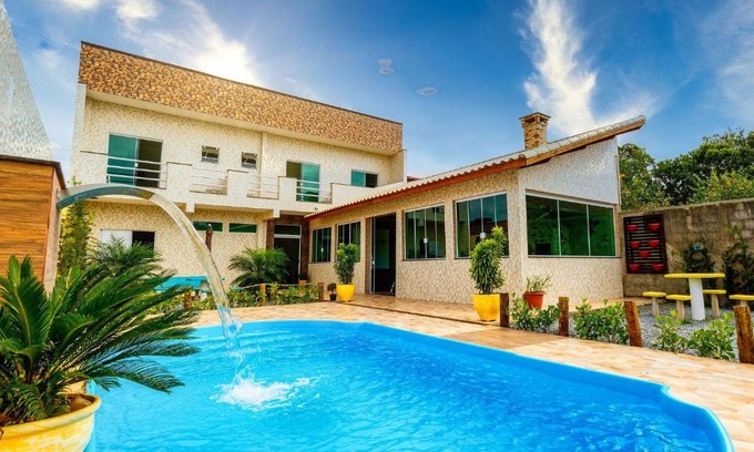 Cidade Nova Peruibe House | House with Swimming Pool and Barbecue area in Peruíbe with lots of comfort for 16 people