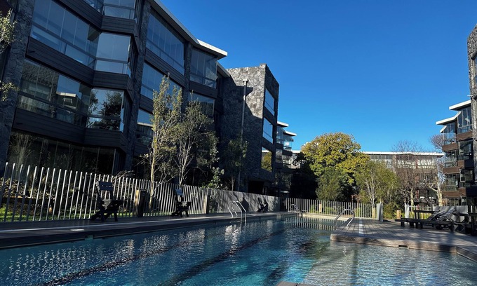 Pucon Apartment | Ideal for couples: centrally located studio with pool and parking.