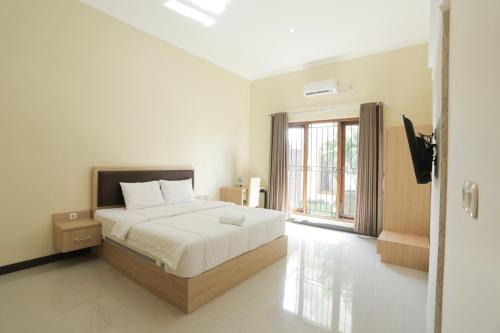 Banjarsari House | IDR Green Guest House Syariah Mitra RedDoorz