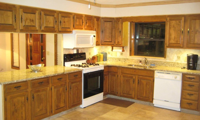 Edgar House | Island Lake Redwood Cottage With Canoe and Grill: Relax, Swim, Fish, Ski, Enjoy