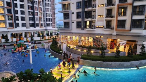 Penampang Apartment | K-Avenue with PS5 and Pool View by JH Project