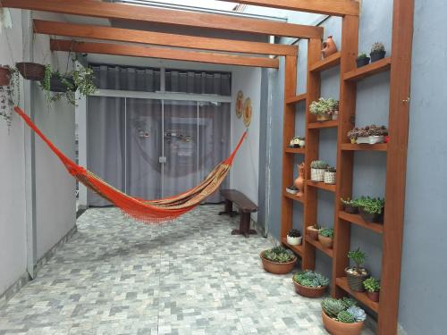 Capao Bonito House | Kitnet com ar condicionado e banheiro externo