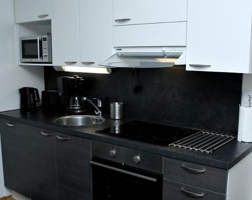 Ylamylly Apartment | Kotimaailma Apartments Joensuu - Koulukatu 21