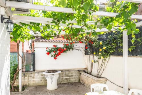 Passoscuro House | La Pergola in Fiore