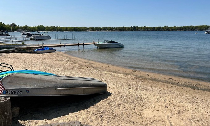 National City Cottage | Lake/beach front property with kayaks, pedal boat, & row boat, near Tawas Bay