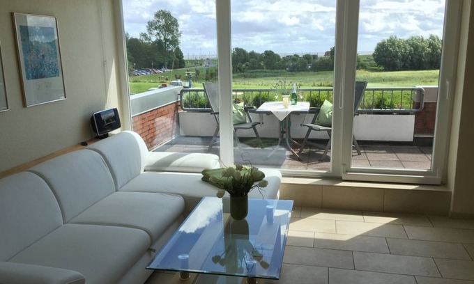 Horumersiel Apartment | Lake view and close to the beach, 2 balconies, bicycles included.