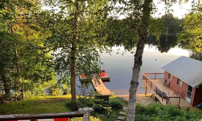 Ahmic Harbour Cottage | Lakefront cottage getaway. Dock by day, fire by night!