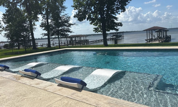 Lake Houston House | Lakehouse…Pool and Hottub. Waterfront property with boat dock.
