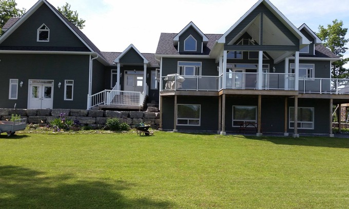 Brighton House | Lakehouse with 800 feet of waterfront near Prince Edward County!