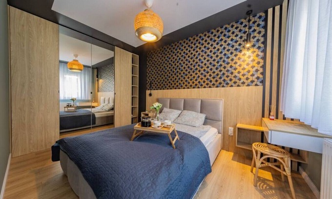 Baluty Apartment | Łódź Spacious Apartments with Parking and Balcony by Rentujemy