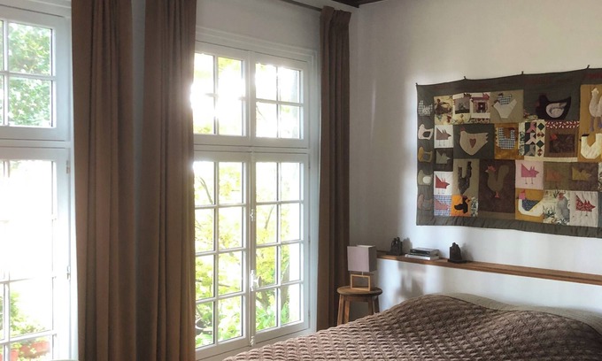 Cote Est Soquence Apartment | Loft-style apartment in a former orangery.