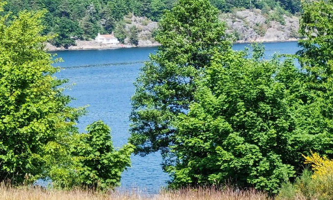 Risor House | Look forward to a great time with the family in this vacation home with fjord view!