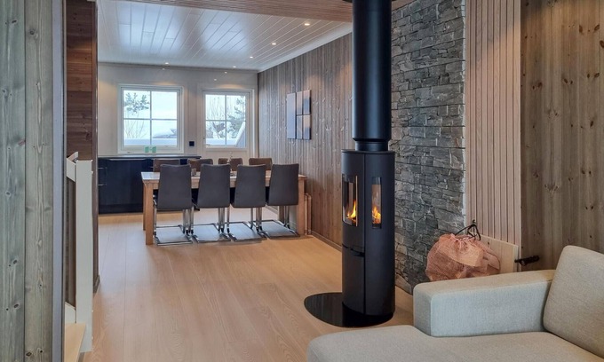 Tjaldal House | Look forward to family time together in this spacious semi-detached house with whirlpool.