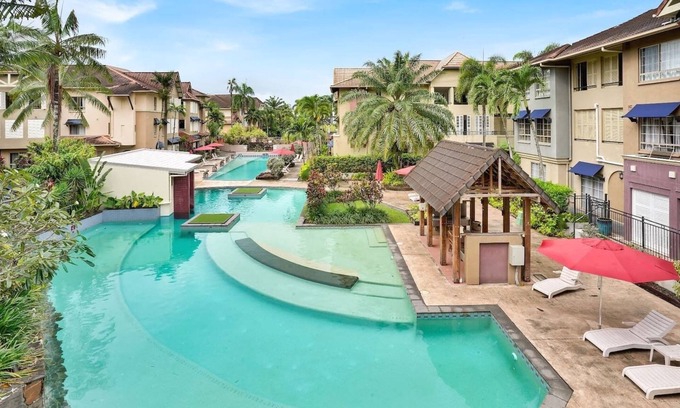 Cairns North Apartment | Lotus Lakes - Tropical 2BR Retreat | Resort Pools | Near Cairns CBD & Botanical Gardens