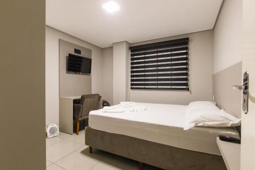 Guarapuava Apartment | Lou Suítes - Suíte 05 - Essência do Silêncio