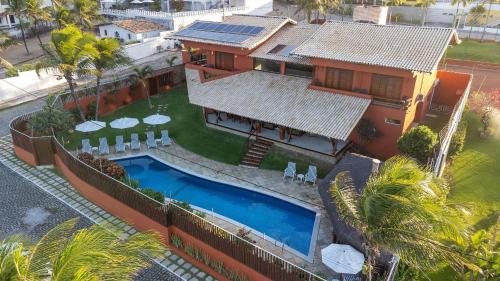 Cotovelo House | Luxo e Conforto na Praia de Cotovelo por Carpediem