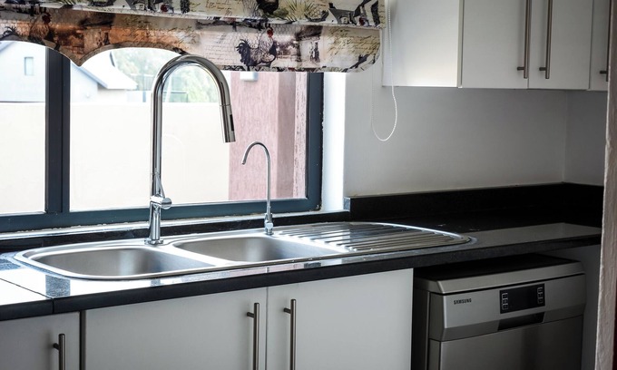 Vredefort House | Luxurious home on an island golf resort Majestic views of the Vaal river Parys