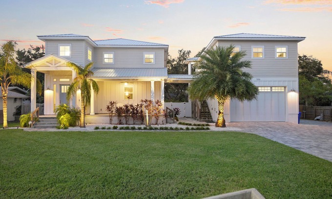 Vilano Beach House | Luxury beach escape, 2 blocks to the ocean & 1 block to the river! Enjoy a heated pool, hot tub, paddle boards, kayaks, golf cart & more—only 10 mins to downtown St. Augustine. Very clean, well stocked & perfect for couples, families & small groups.