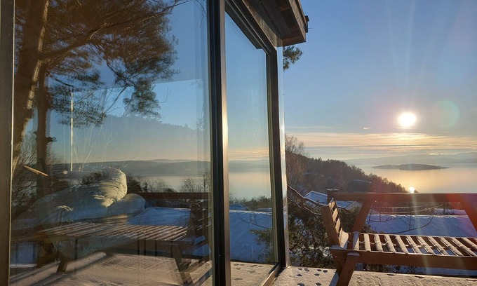Nesodden Cabin | Luxury by the fjord of Oslo. nWelcome to a mirrored cabin with great views