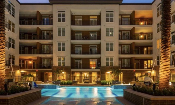 Central Business District Apartment | LUXURY DOWNTOWN SUITE WITH POOL AND FREE PARKING!